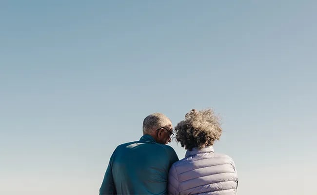 Couple Sitting with back to camera