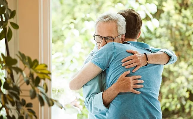 Father son hugging